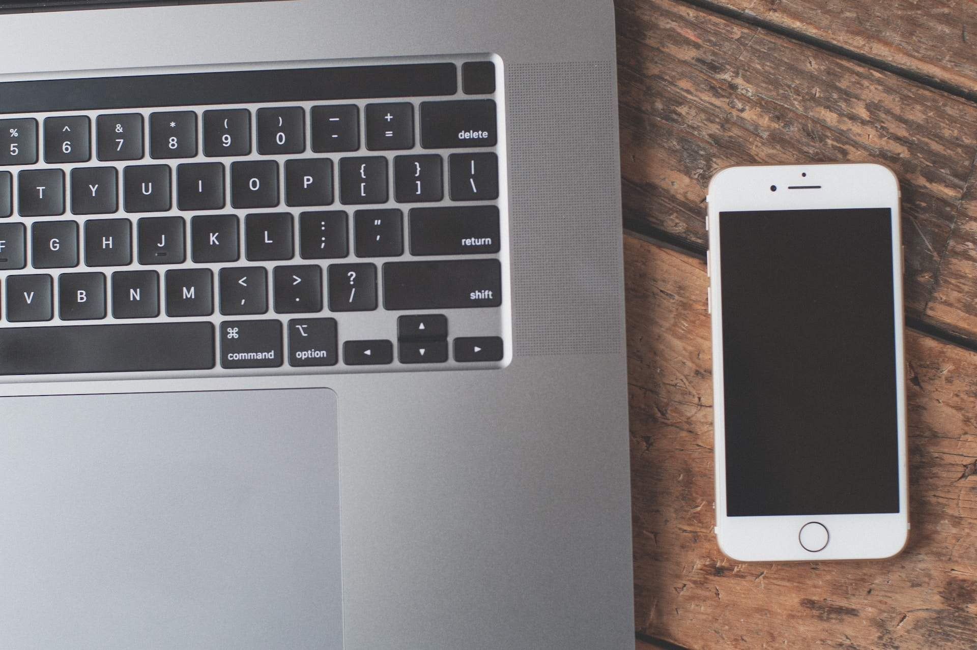 Laptop and phone side by side